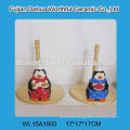 Promotional kitchen penguin utensil holder